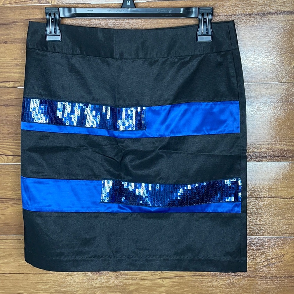 New with tags All Star women’s skirt size small blue black sparkly